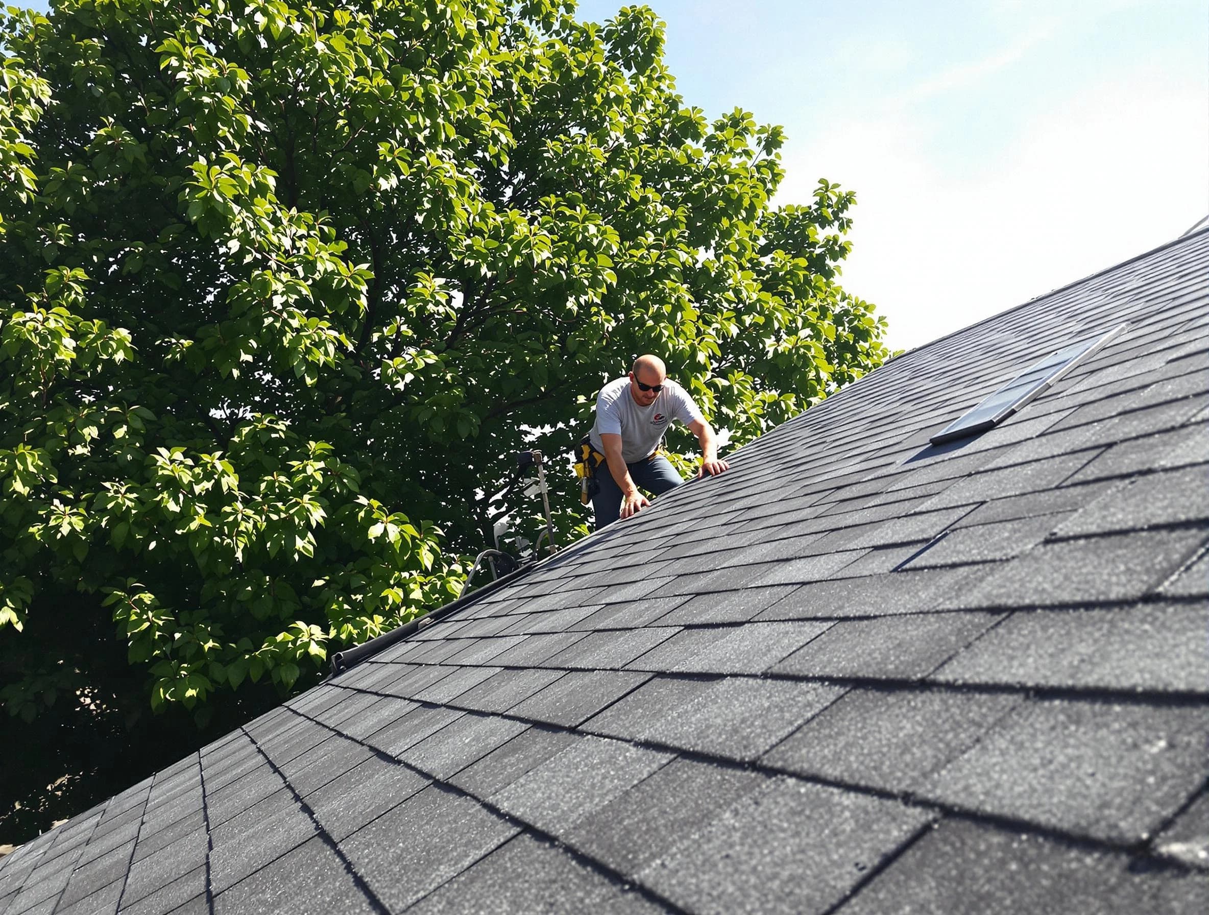 Certified roofers from Maple Heights Roofing Company working in Maple Heights, OH